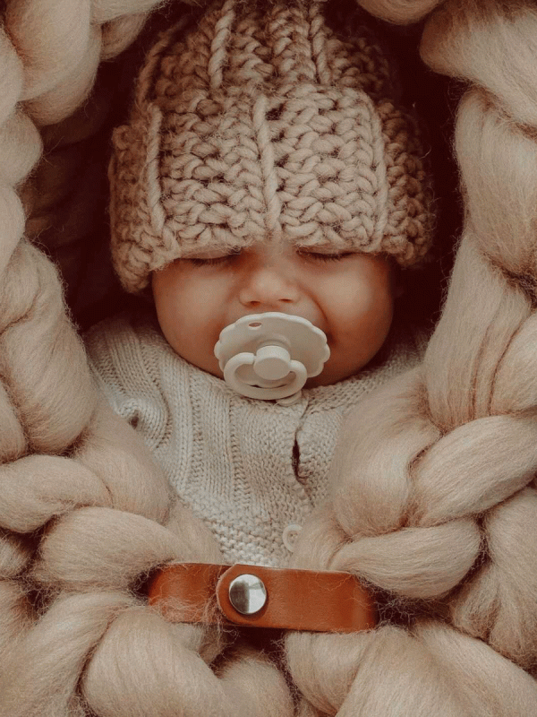 Kaunis Halivia vaalea vauvan merinovillainen lämpöpussi.