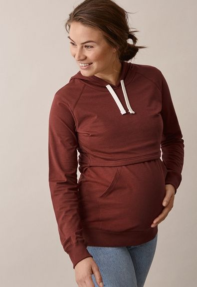 Boob Design B-Warmer Hoodie imetyshuppari pitää rinnat lämpöisenä niin paukkuvina talvipakkasina kuin kesän koleina iltoina. Paita on kaksinkertaista kangasta rintojen kohdalta ja alempi kerros on lämmittävää fleeceä.