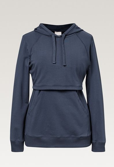 Boob Design B-Warmer Hoodie imetyshuppari pitää rinnat lämpimänä niin paukkuvilla pakkasilla kuin koleilla kesäiltoina. Paita on kaksinkertaista kangasta rintojen kohdalta ja alempi kerros lämmintä fleeceä.